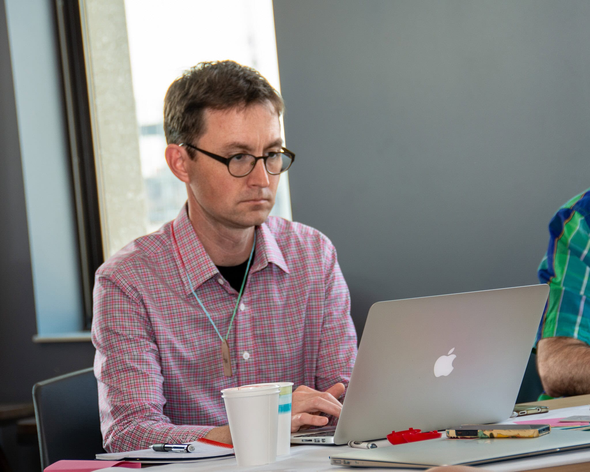 Andy Crestodina working on his laptop during the Genius Shared Workshop in June 2014.